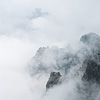 Among the Clouds (Huangshan III) Photo: Early morning or late afternoon, chances are high that you'll be enveloped by wispy clouds that roll gently up Huangshan's steep and craggy sides.