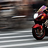 Rocketeers Photo: A crotch rocket races past an intersection near the Yi Sun Shin statue in Seoul.