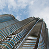 Cloud Chafers (Panorama) Photo: Bottom-up view of one of the Petronas Twin Towers.