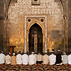 Worship Wall Photo: Muslims kneel for prayer in Jamia Masjid's cavernous prayer hall.