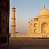 Glossy Ground Photo: The Taj Mahal at sunrise is seen through the doors of the Jawab. (From the archives, due to time restraints.)