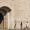 Rampart Roamers Photo: Tourists wander around the fortification of the old city of Aigues Mortes.