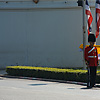 Thai Royal Guard Photo: A Thai Royal guard near the wall of the National Palace awaits the arrival of the King of Thailand.