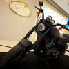 Bangkok Harley Exhibit Photo: A black custom-built Harley Davidson at a motorcycle show in Bangkok's Central World mall.