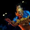 photo: Traditional Thai Dance Poles - A unique traditional Thai dance performance featuring a female dancer controlled by a puppet-master using poles.
