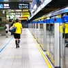 Spotless Subway Photo: A passenger walks on an immaculate subway platform on the metro system in Taipei.