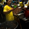 Nut Nut Photo: A chestnut vendor cooks up a batch at the night market Kuala Lumpur's Chinatown (ARCHIVED PHOTO on the weekends - originally photographed 2006/09/29).
